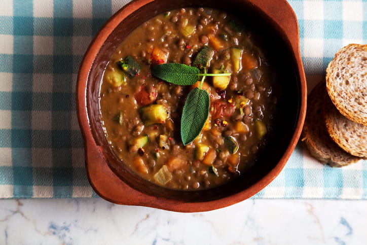 Bowl of lentil minestrone soup.