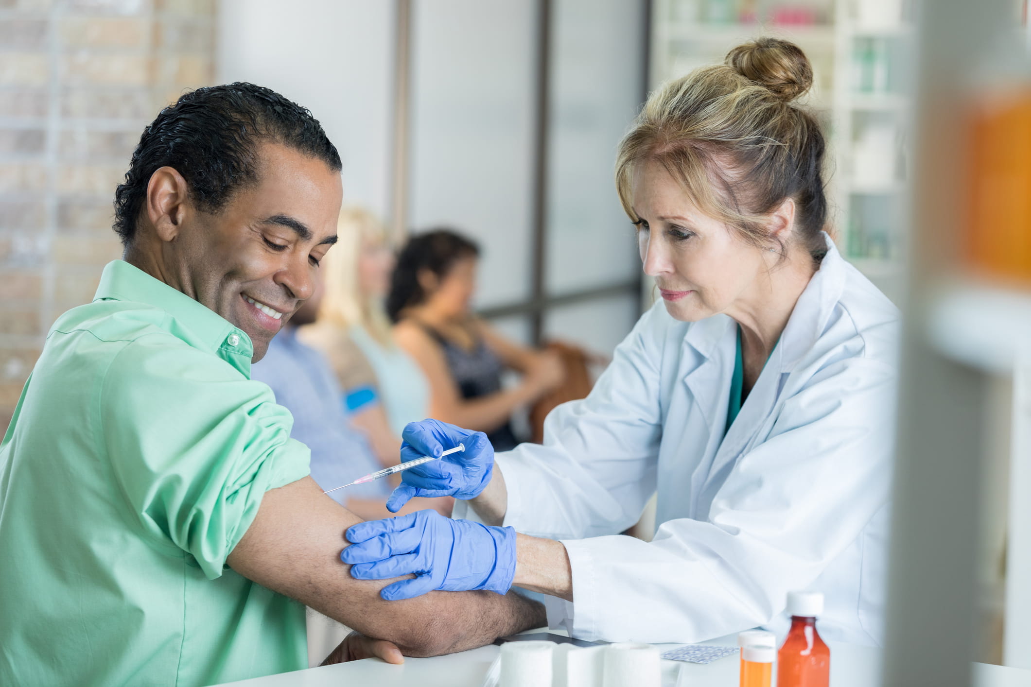 Healthcare specialist giving a vaccination