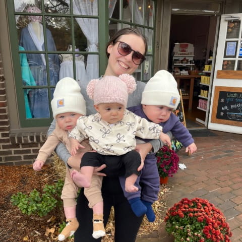 Anna Murphy holding baby triplets Crew, Archer and Margot