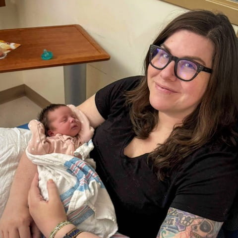 Jacqueline Berrett holding her baby girl