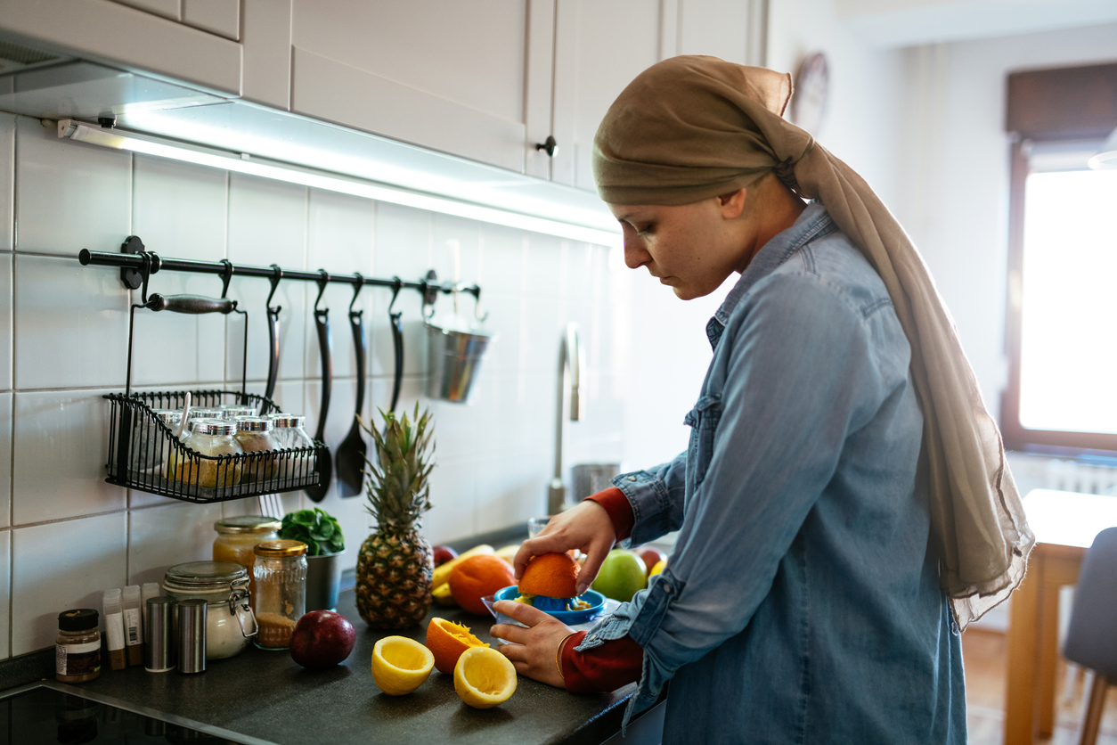 Cancer patient preparing a healthy snack