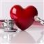 plastic red heart with a stethoscope