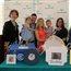 (Left to right) Margie Iacobacci, vice president of patient services at Lankenau Medical Center; the Clement family (their daughter Grace, who is 2, Chris and Beth Clement, and their son Henry, who is 3); Lynne Menei, nurse manager of the Lankenau Labor and Delivery Unit; Casey Bien-Aime, Lankenau Medical Center chaplain; and Dr. Norman Brest, Lankenau Medical Center campus chief of the department of OB/GYN