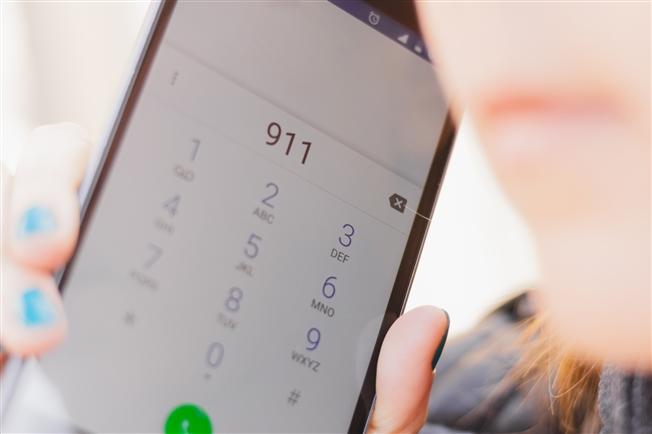 Closeup shot of phone display with the number 911 dialed Closeup shot of phone display with the number 911 dialed