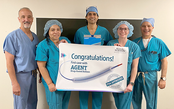 William Gray, MD; Sarang Mangalmurti, MD, Timothy Shapiro, MD (back row) and fellow members of the Lankenau Heart Institute team
