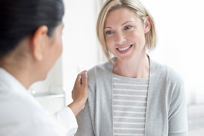 woman with doctor