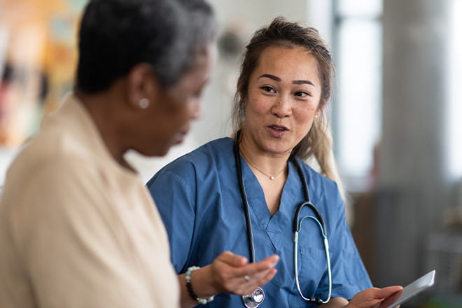 doctor talking to patient
