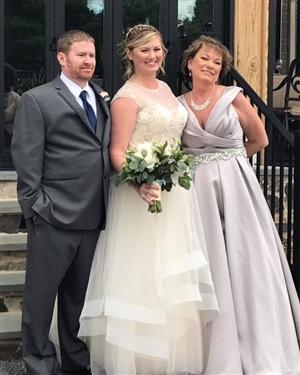 Kathryne Peterson (right) with her son Erik (left) and daughter Erin (center) on Erin&#39;s wedding day