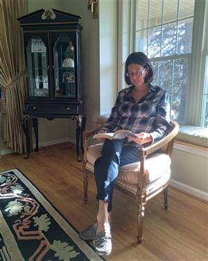 Susan McCorry reading at home