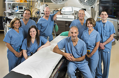 Left to right: Sandra Abramson, MD; Roberto Rodriquez, MD; Paul Coady, MD; Scott Goldman, MD; Lisa Igidbashian, CRNP; and Eric Gnall, DO. Seated: Kate Hawthorne, MD and William Gray, MD.